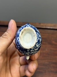 Two Chinese blue and white vases, two miniature jugs and a tea caddy, Kangxi