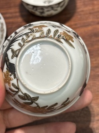 A pair of Chinese grisaille and gilt 'pheasant' cups and saucers, Yongzheng