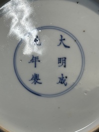 A Chinese doucai plate with pomegranates, plums and grapes, Chenghua mark, Kangxi