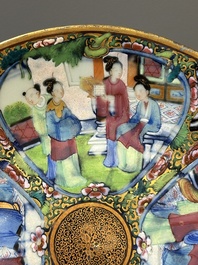 A pair of Chinese blue and white Canton-decorated plates, a famille rose 'playing boys' plate and a reticulated plate, 19th C.