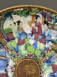 A pair of Chinese blue and white Canton-decorated plates, a famille rose 'playing boys' plate and a reticulated plate, 19th C.