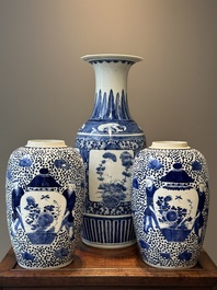 A pair of Chinese blue and white jars and a vase, Kangxi mark, 19th C.