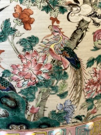 A Chinese famille rose garden seat with birds among blossoming branches, 19th C.