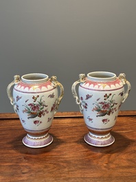 A pair of Chinese famille rose 'cornucopia' vases with chilong handles, Qianlong