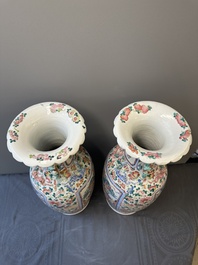 A pair of Chinese famille rose vases with narrative design, 19th C.