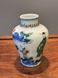 A small Chinese wucai jar with figures in a landscape, Transitional period