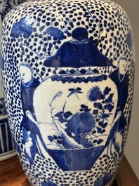 A pair of Chinese blue and white jars and a vase, Kangxi mark, 19th C.