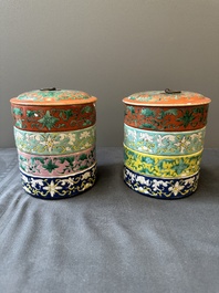A pair of Chinese famille rose four-tier stacking boxes and a teapot, 19th C.