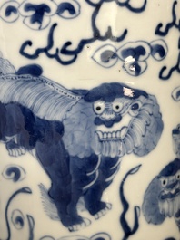 A pair of Chinese blue and white 'Buddhist lion' vases, Kangxi mark, 19th C.