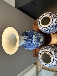 A pair of Chinese blue and white jars and a vase, Kangxi mark, 19th C.