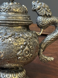A fine Tibetan silver plated 'bajixiang' teapot, 19th C.