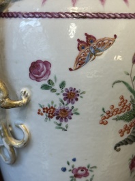 A pair of Chinese famille rose 'cornucopia' vases with chilong handles, Qianlong