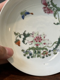 A pair of Chinese famille rose 'peony and butterfly' plates, Yongzheng/Qianlong