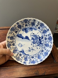 A pair of Chinese blue and white 'Mongolian hunting scene' plates and a pair of plates with floral design, Chenghua and Kangxi mark, Kangxi