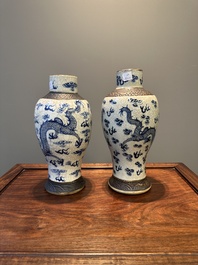 Two pairs of Chinese blue and white Nanking crackle-glazed 'dragon' vases and a dish, Chenghua mark, 19th C.