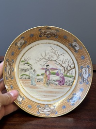 A Chinese Canton famille rose covered bowl and a matching plate, 19th C.