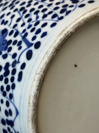 A pair of Chinese blue and white jars and a vase, Kangxi mark, 19th C.