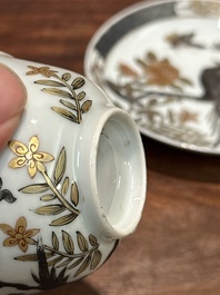 A pair of Chinese grisaille and gilt 'pheasant' cups and saucers, Yongzheng