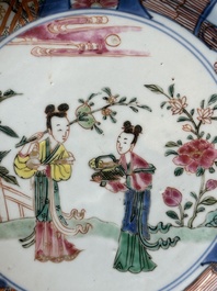 A pair of Chinese famille rose bowls and four plates, Yongzheng/Qianlong