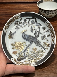 A pair of Chinese grisaille and gilt 'pheasant' cups and saucers, Yongzheng