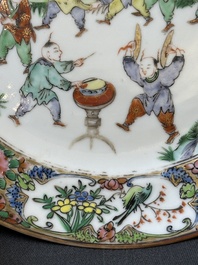 A pair of Chinese blue and white Canton-decorated plates, a famille rose 'playing boys' plate and a reticulated plate, 19th C.