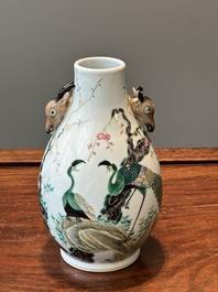 A Chinese famille rose 'hu' vase with peacocks, Yongzheng mark, 19th C.