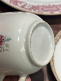 A pair of monogrammed Chinese puce-enamelled plates and a pair of armorial cups and saucers, Yongzheng/Qianlong