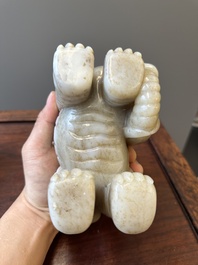 A pair of Chinese white and russet jade sculptures of elephants, Qianlong