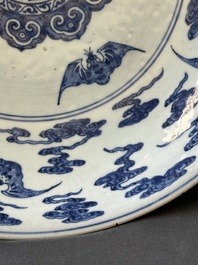 A large Chinese blue and white 'bats and longevity' dish, 19th C.