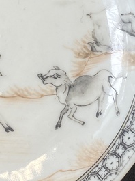 A pair of Chinese grisaille and iron-red 'buffalo' cups and saucers and a 'rooster' saucer, Yongzheng