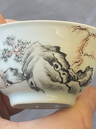 A pair of Chinese grisaille and iron-red 'buffalo' cups and saucers and a 'rooster' saucer, Yongzheng