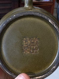A Chinese monochrome teadust-glazed teapot, Yongzheng seal mark, 18/19th C.