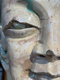 An imposing Chinese sancai glazed stoneware head of a monk, Yuan/Ming