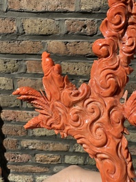 A Chinese red coral figure of Xiwangmu on wooden stand, 19/20th C.