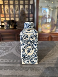 A rectangular Dutch Delft blue and white teacaddy and cover, 18th C.