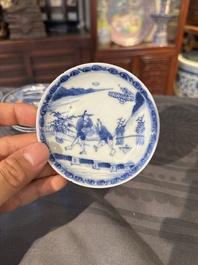 Treize soucoupes et douze tasses en porcelaine de Chine en bleu et blanc &agrave; d&eacute;cor figuratif, Kangxi/Yongzheng