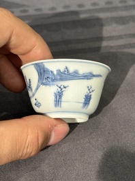 Thirteen Chinese blue and white saucers and twelve cups with figural design, Kangxi/Yongzheng