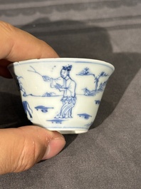 Thirteen Chinese blue and white saucers and twelve cups with figural design, Kangxi/Yongzheng