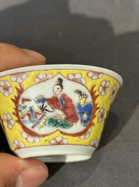 Cinq tasses et soucoupes en porcelaine de Chine famille rose &agrave; d&eacute;cor des 'quatre arts 四藝' sur fond jaune, Yongzheng