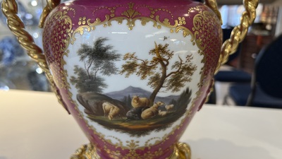 A pair of French parcel-gilt polychrome pink-ground porcelain potpourri vases, Jacob Petit, Paris, 19th C.