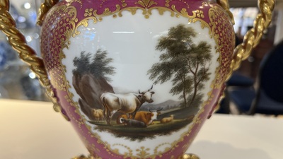 A pair of French parcel-gilt polychrome pink-ground porcelain potpourri vases, Jacob Petit, Paris, 19th C.