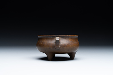 A Chinese bronze censer and stand, Xuande mark, 17th C.