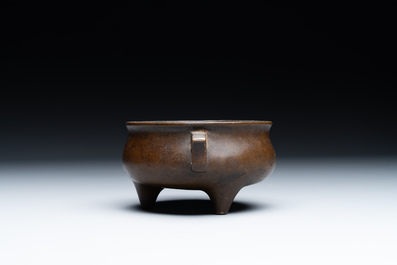 A Chinese bronze censer and stand, Xuande mark, 17th C.