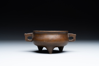 A Chinese bronze censer and stand, Xuande mark, 17th C.