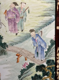 A Chinese famille rose 'eight immortals' plaque in a wooden frame, 18/19th C.