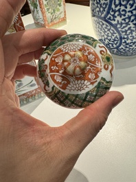 A Chinese blue and white bottle-shaped 'lotus scroll' vase and a pair of square famille verte flasks and covers, 19th C.