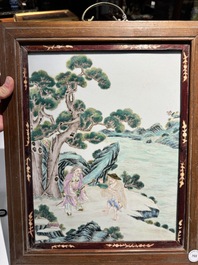 A Chinese famille rose 'two sages in the mountain' plaque in a wooden frame, 18/19th C.