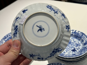 Ten Chinese blue and white cups and fourteen saucers with floral design, lingzhi mark, Kangxi