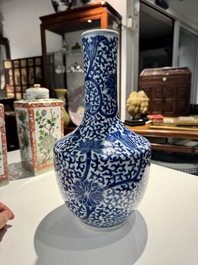 A Chinese blue and white bottle-shaped 'lotus scroll' vase and a pair of square famille verte flasks and covers, 19th C.