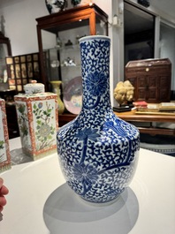 A Chinese blue and white bottle-shaped 'lotus scroll' vase and a pair of square famille verte flasks and covers, 19th C.
